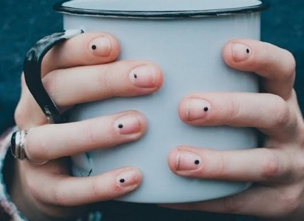 plain nails with small single black dot 