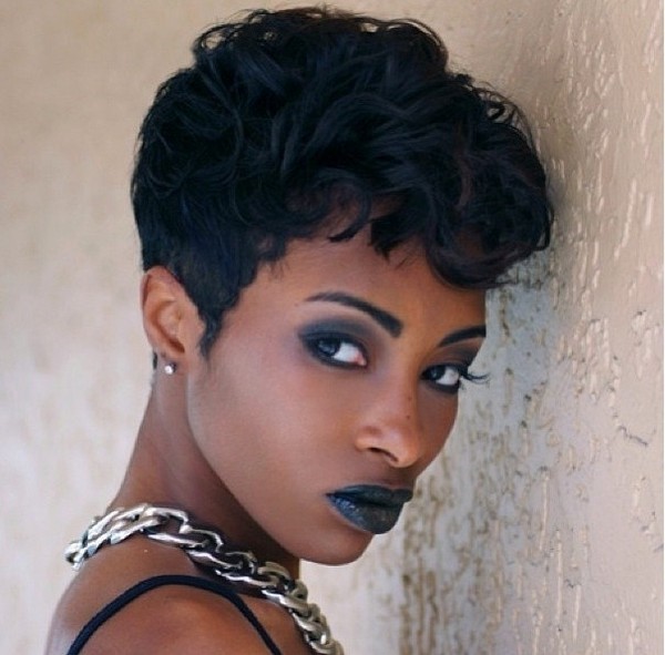 Black woman with Curly Pixie Cut and  Shaved Sides