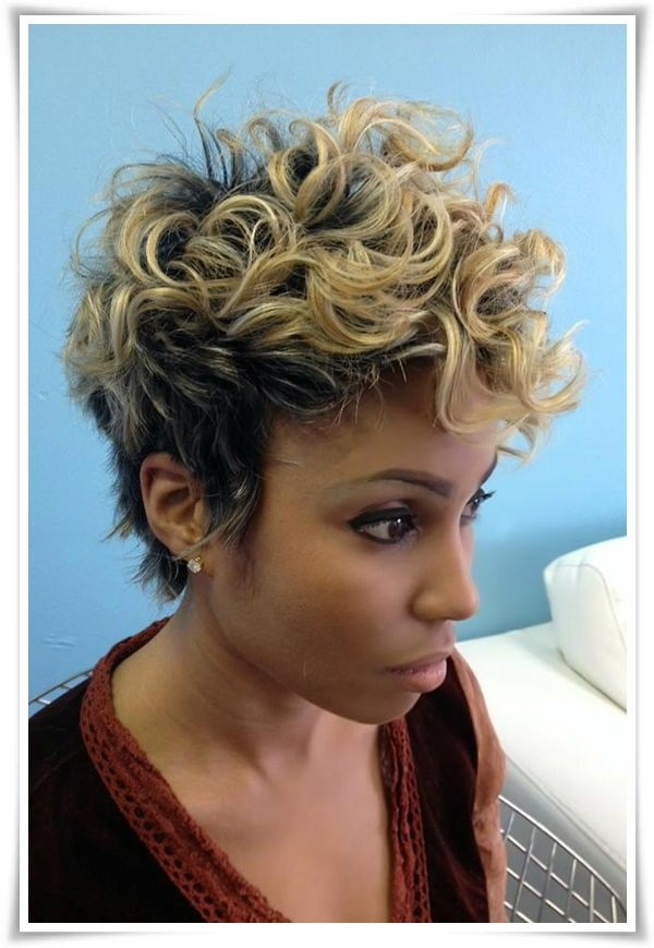 Black Woman with Blonde Curly Hairstyle and Layered Undercut