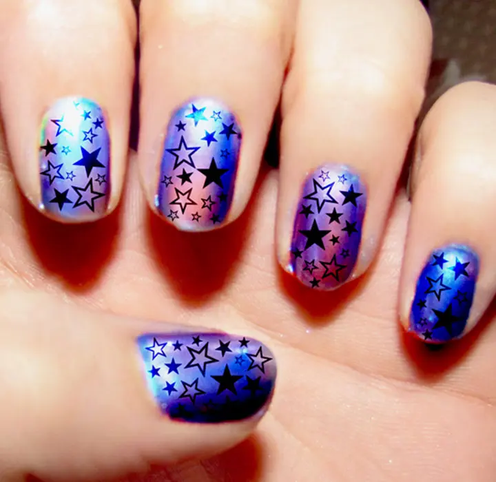 purple nails with stars 