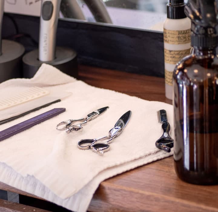 image of combs, scissors and hair products