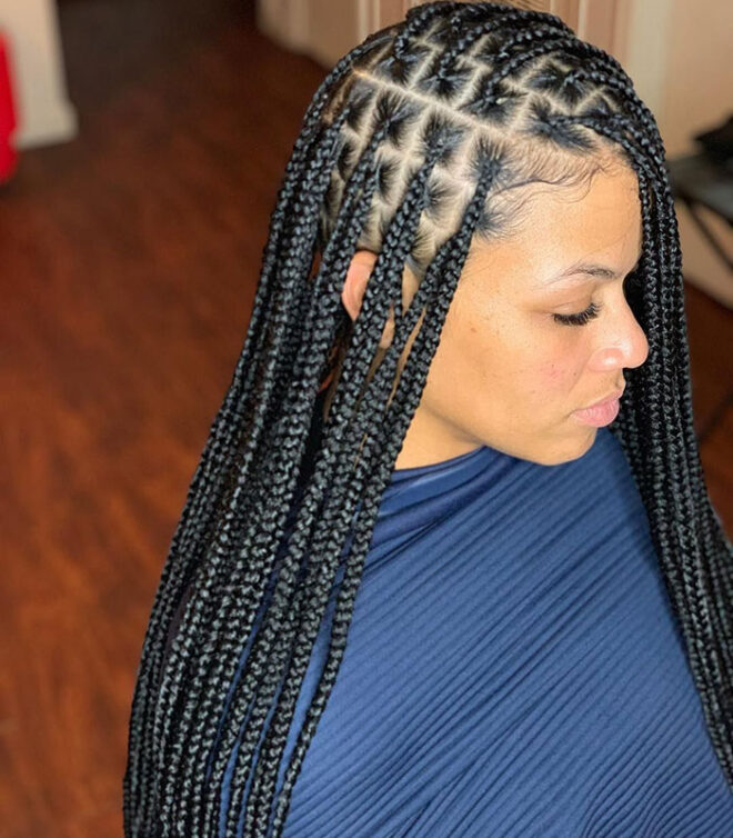 woman with long box braids