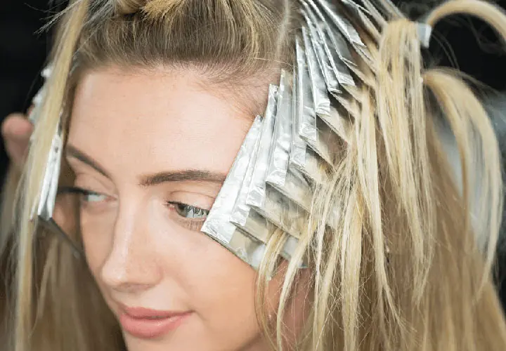 hair highlights woman with foil for babylights