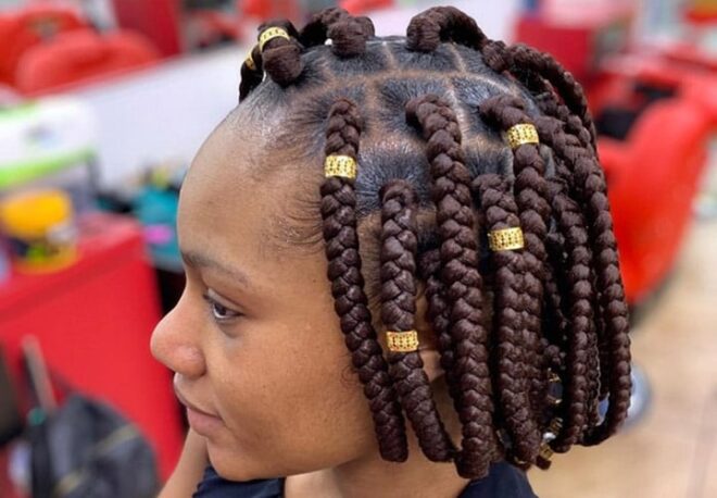 woman with jumbo box braids bob style