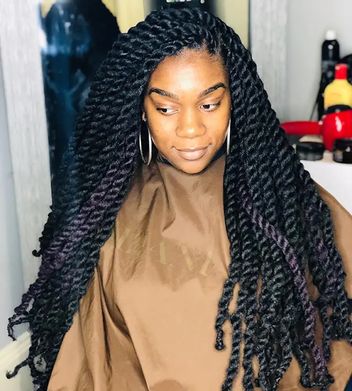 woman with long black and purple marley braids