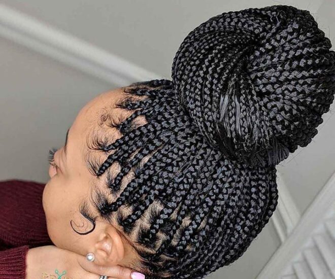 woman with long jumbo box braids in high bun jpg