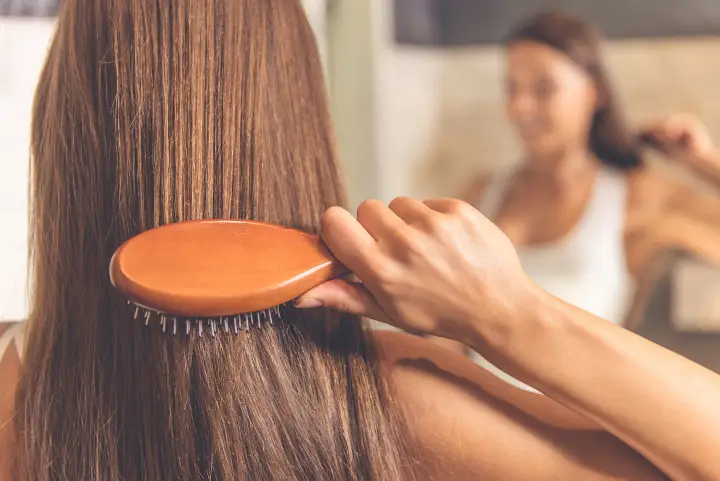 woman brushing hair