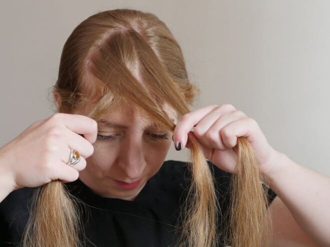 woman starting to plait